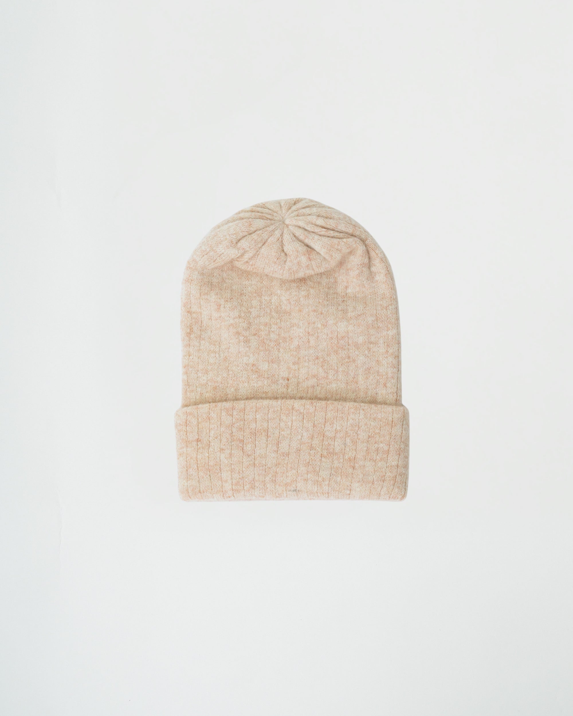 Beige knit beanie on a light gray background