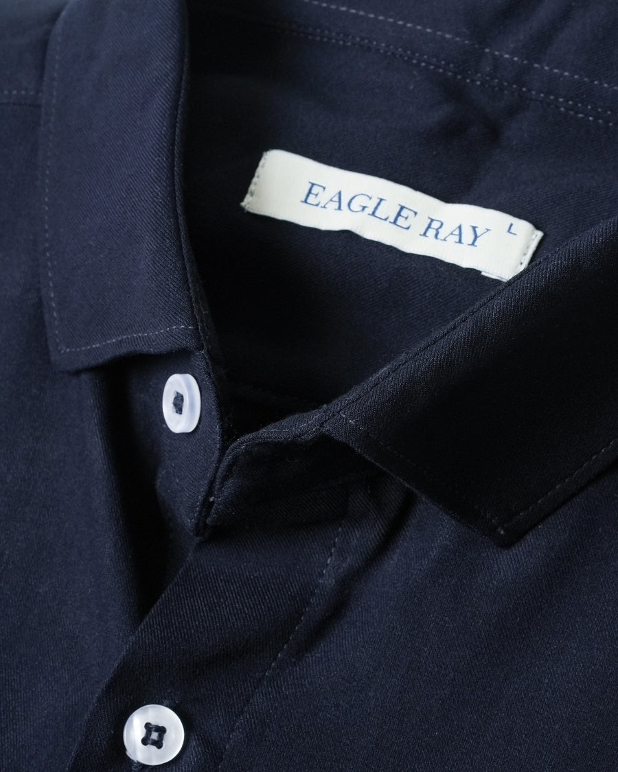 Navy shirt with 'Eagle Ray' label on collar