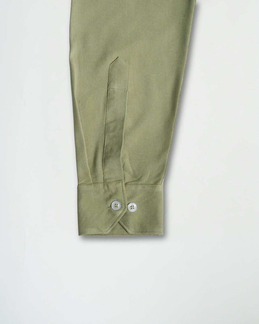 Green sleeve with buttons on a white background