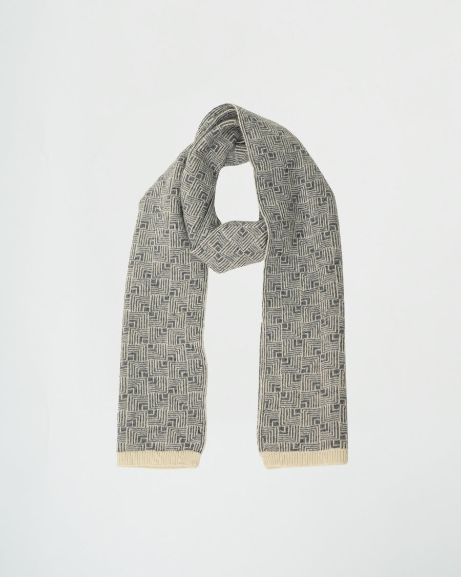 Gray patterned scarf with beige trim on a white background
