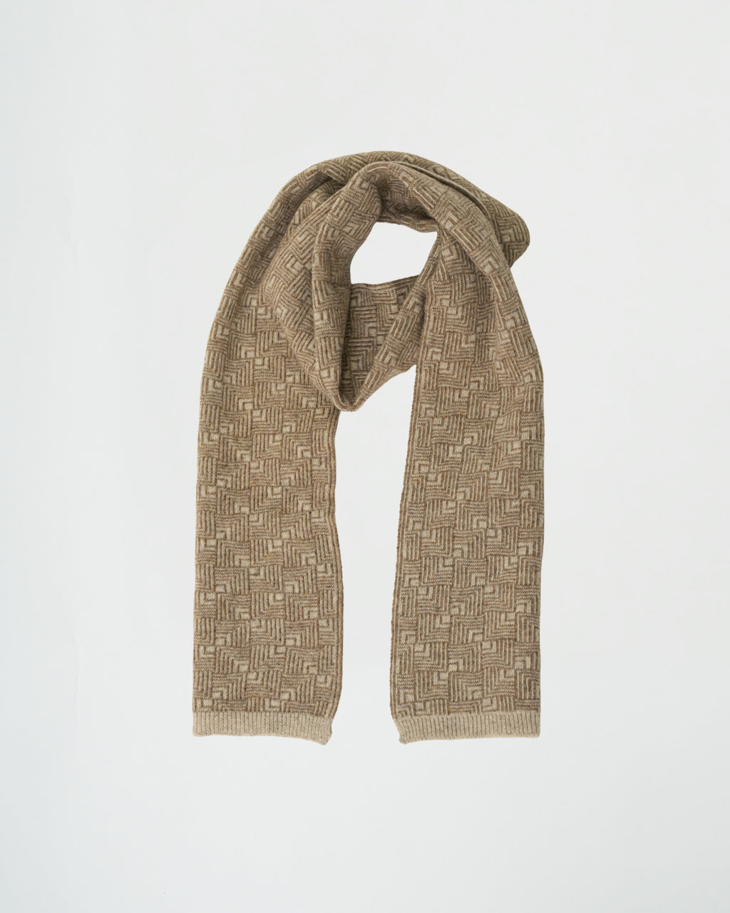 Knitted scarf with geometric pattern on a light gray background