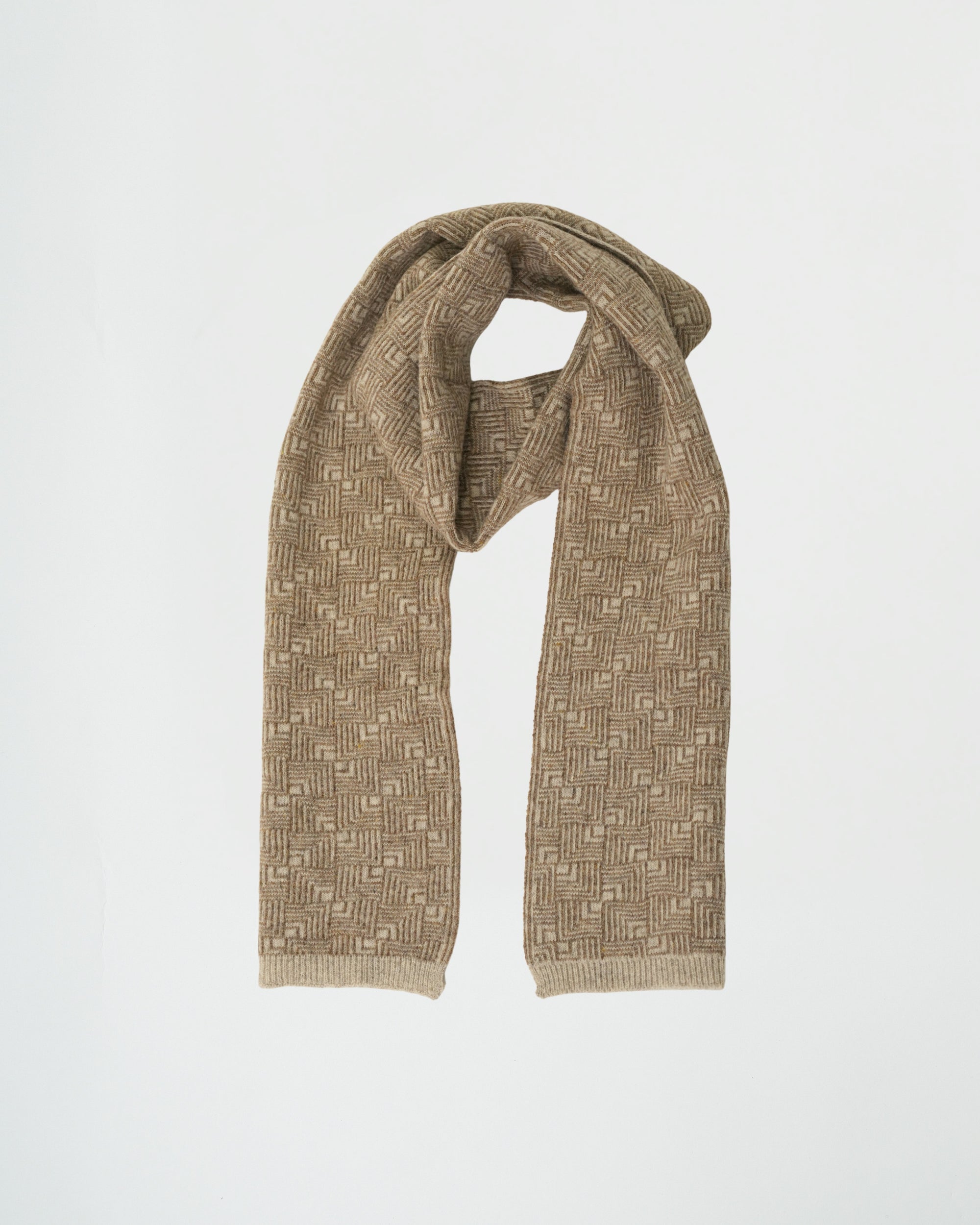 Knitted scarf with geometric pattern on a light gray background
