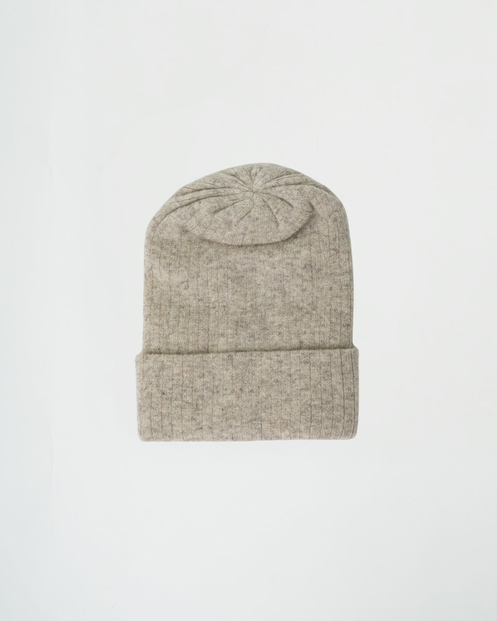 Beige knit beanie on a light gray background