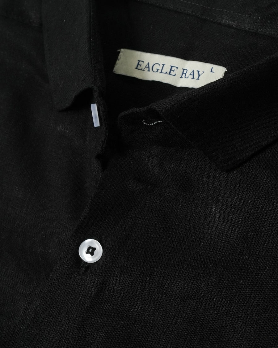 Black shirt with 'Eagle Ray' label on a dark background