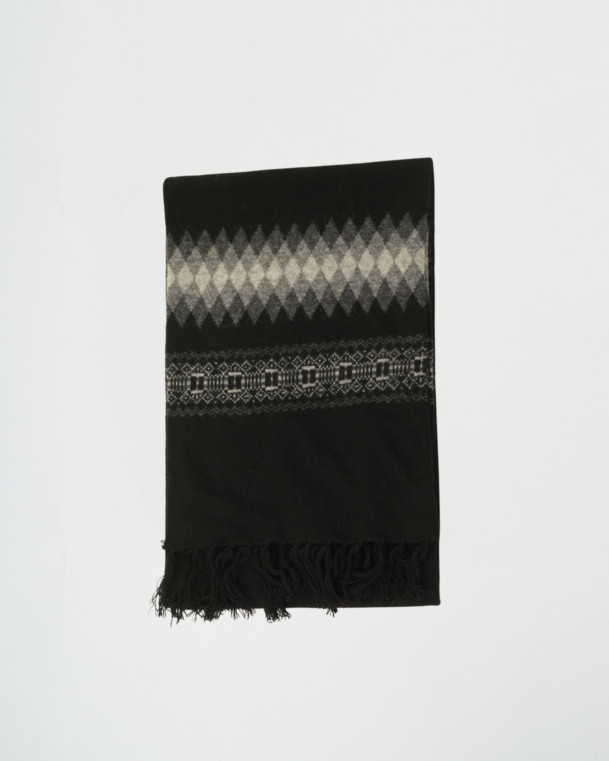 Black scarf with a patterned design on a white background