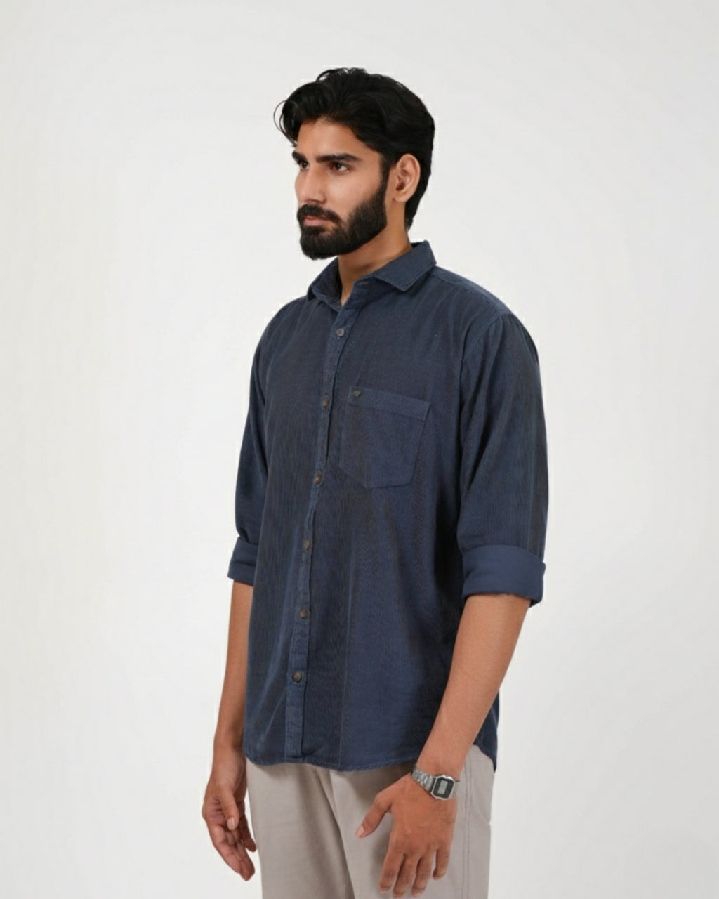 Man wearing a navy blue shirt on a white background