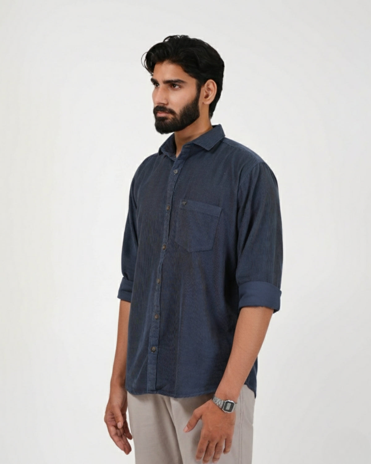 Man wearing a navy blue shirt on a white background