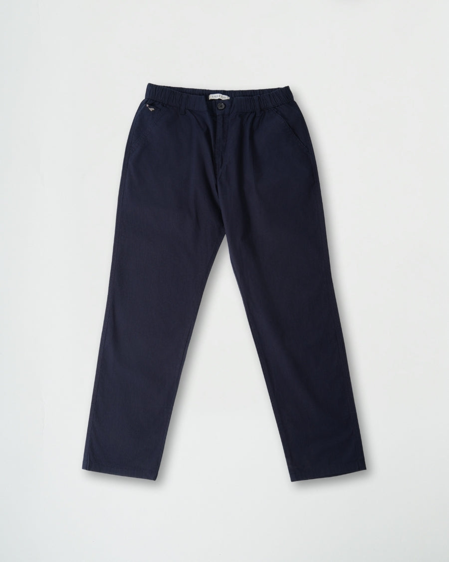Navy blue pants on a light gray background