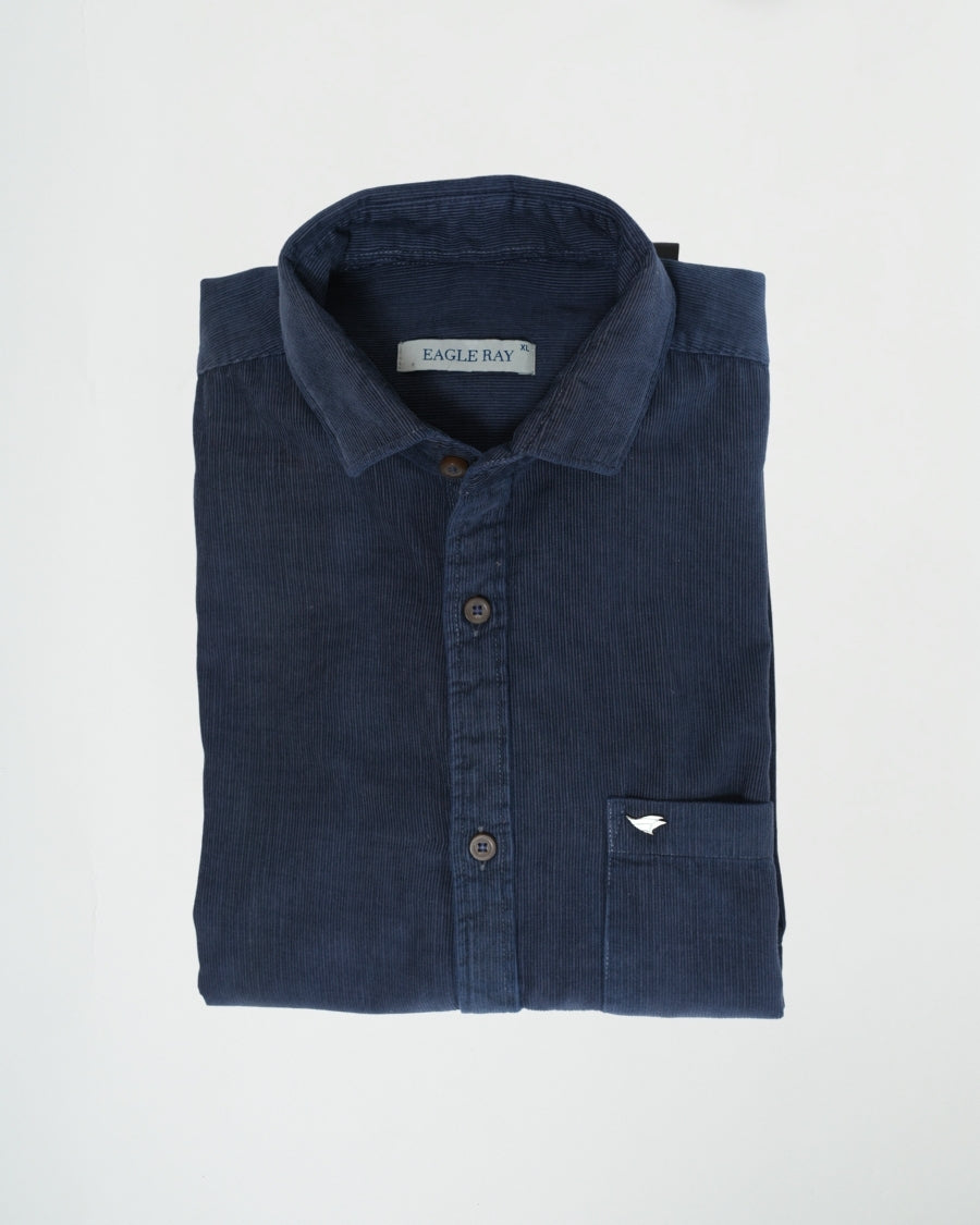 Folded navy blue shirt with a brand label on a white background