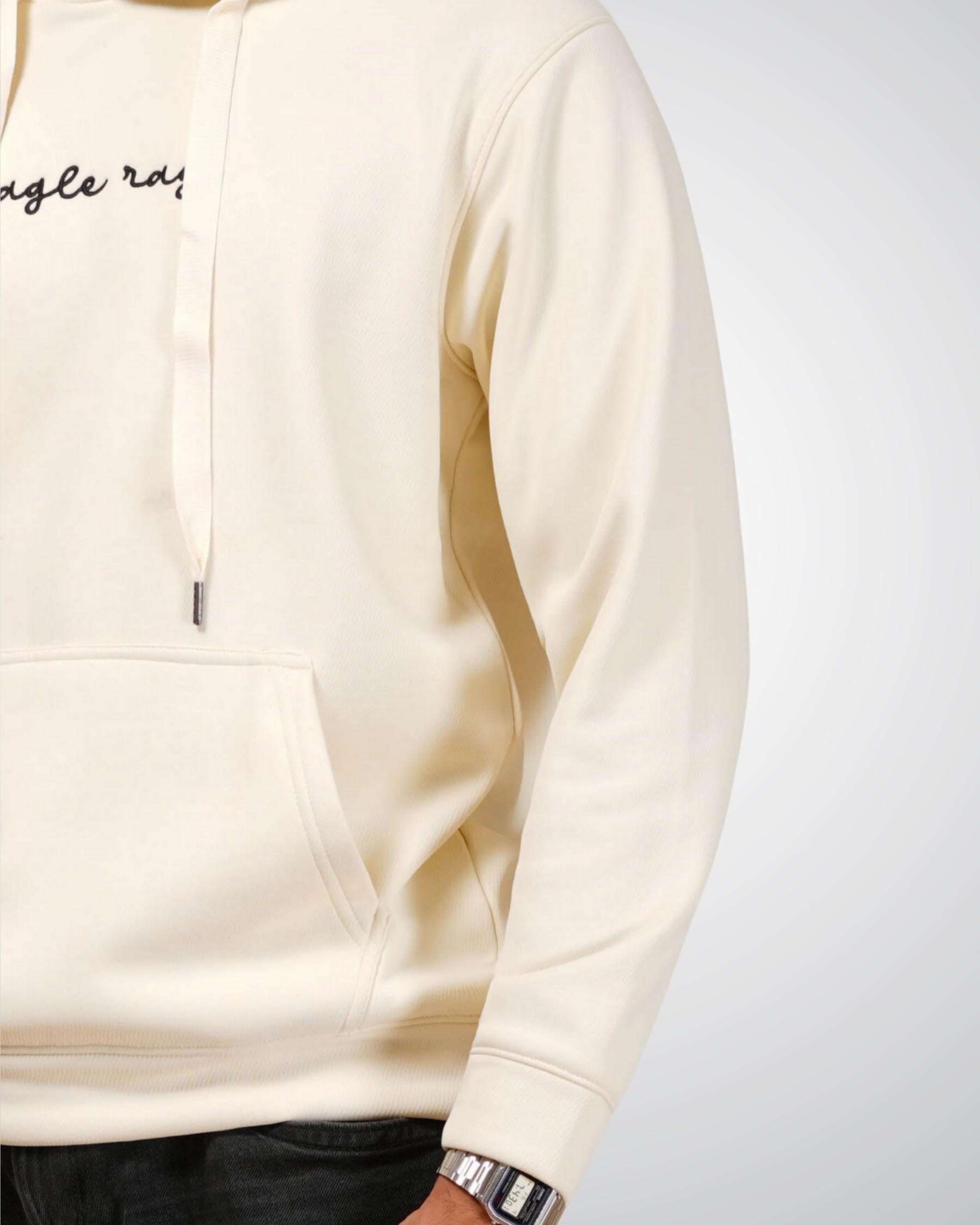 Beige hoodie with text on a plain background