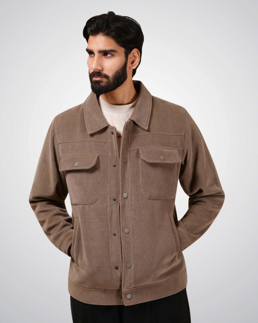 Man wearing a brown jacket on a white background