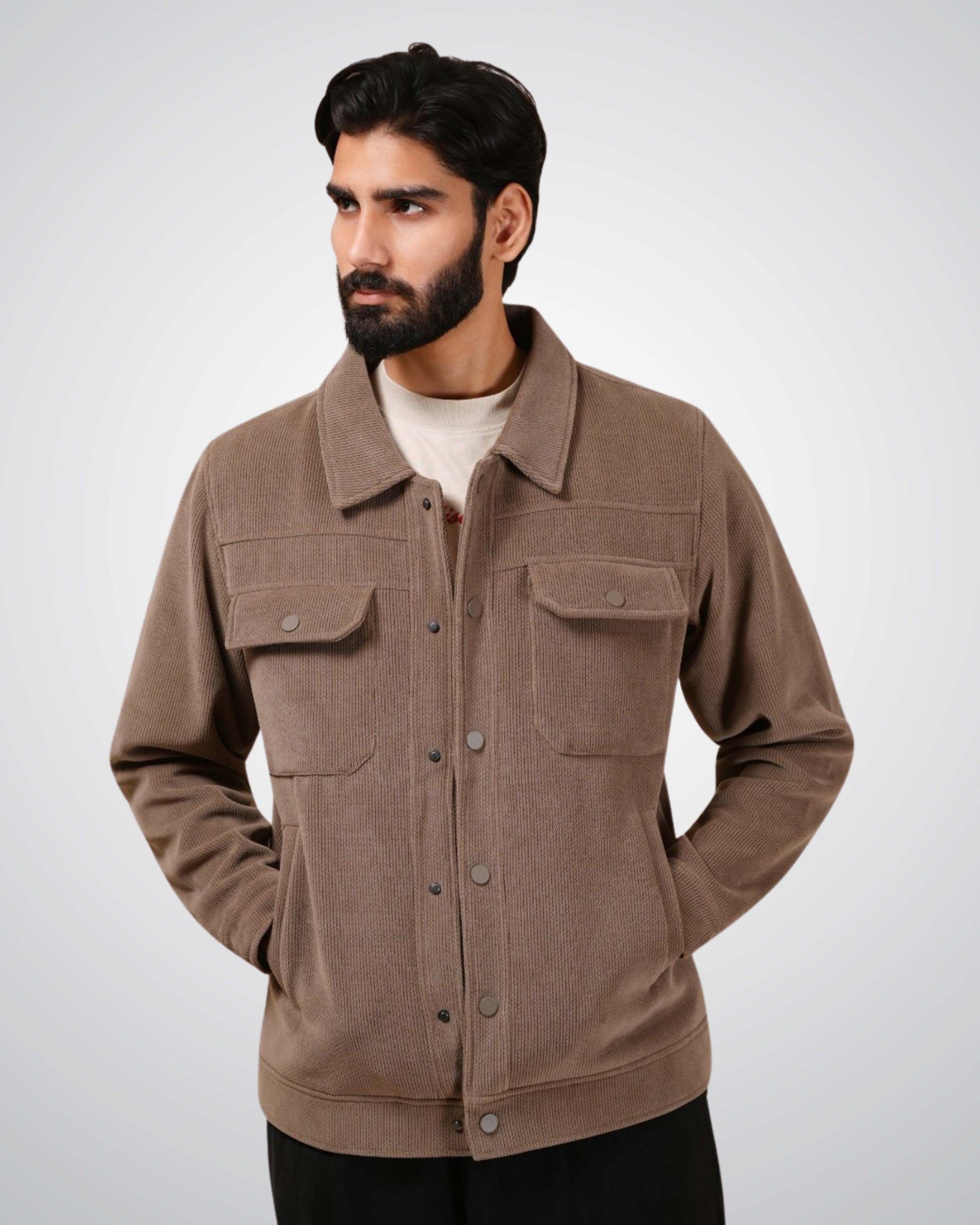 Man wearing a brown jacket on a white background