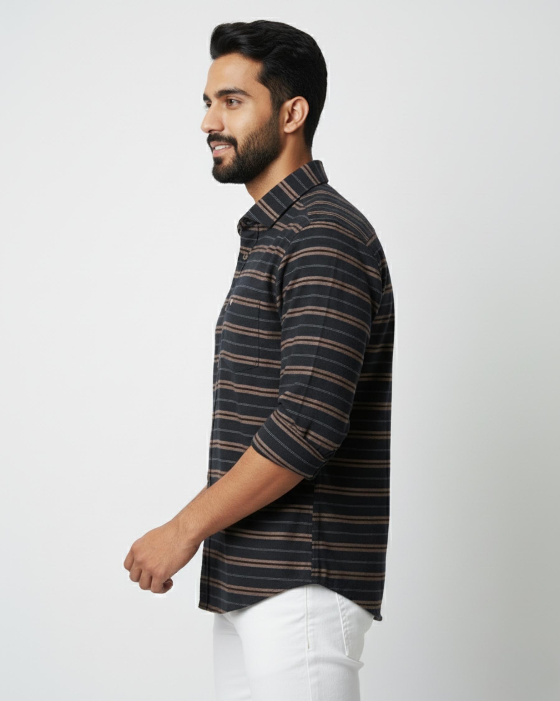 Man wearing a striped shirt on a white background