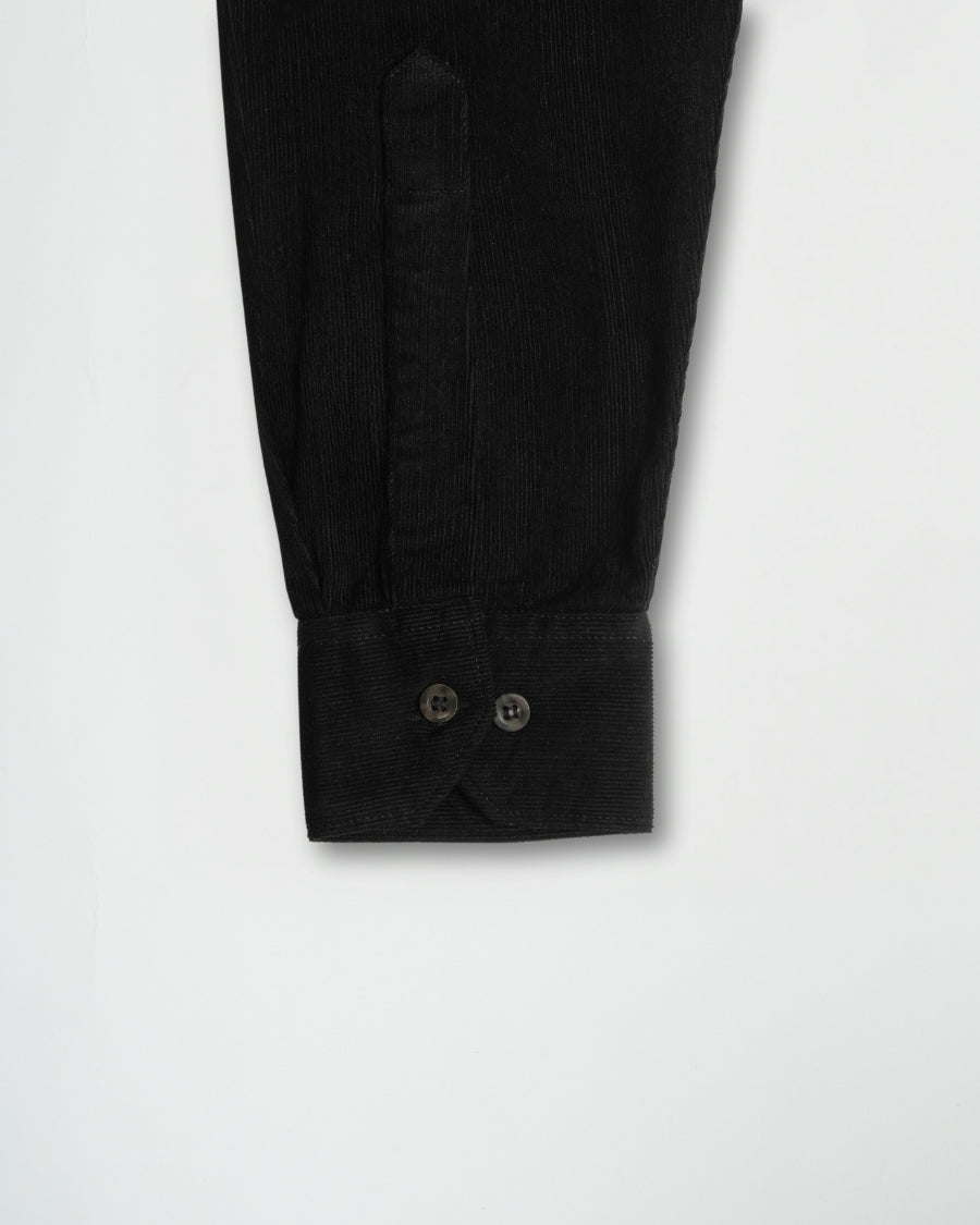 Black pants with buttons on a white background